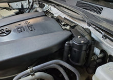 Load image into Gallery viewer, J&L 16-23 Toyota Tacoma 3.5L Driver Side Oil Separator 3.0 - Black Anodized