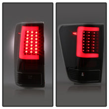 Load image into Gallery viewer, xTune 04-15 Nissan Titan Light Bar LED Tail Lights - Black (ALT-ON-NTI04-LBLED-BK)