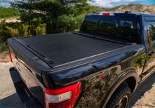 Load image into Gallery viewer, Roll-N-Lock 15-18 Chevy Silverado/Sierra 2500/3500 LB 96-3/8in M-Series Retractable Tonneau Cover