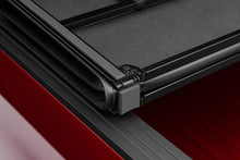 Load image into Gallery viewer, Lund 15-17 Chevy Silverado 3500 Fleetside (6.6ft. Bed) Hard Fold Tonneau Cover - Black