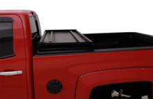 Load image into Gallery viewer, Lund 15-17 Chevy Silverado 3500 Fleetside (6.6ft. Bed) Hard Fold Tonneau Cover - Black