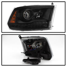 Load image into Gallery viewer, xTune Dodge Ram 13-17 ( w/ Factory Projector LED) Projector Headlight - Black HD-JH-DR13-P-BK