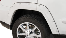 Load image into Gallery viewer, Bushwacker 11-18 Jeep Grand Cherokee Pocket Style Flares 4pc Does Not Fit SRT8 - Black